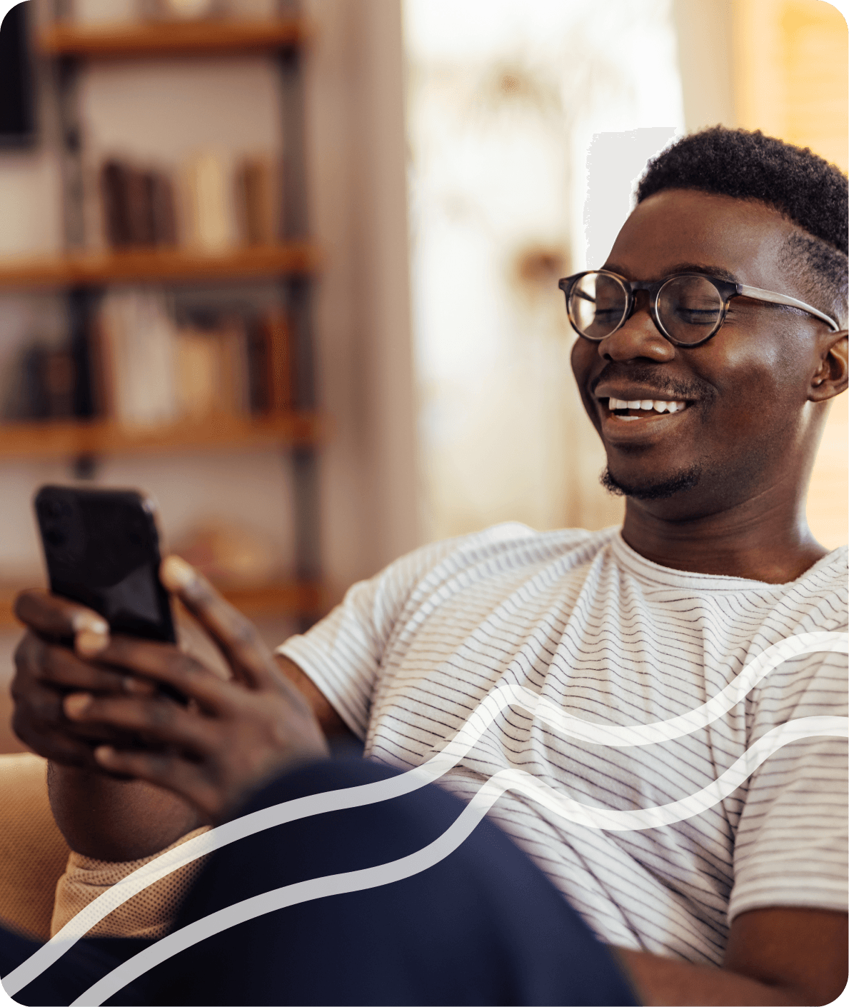 A man smiling while using the PadiePay app on his phone